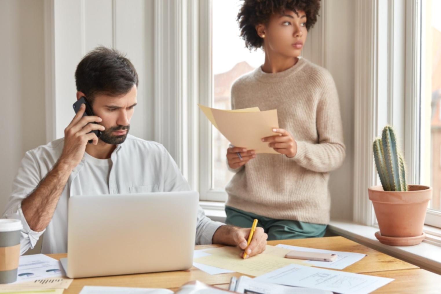 Financial analysts reviewing corporate data and market trends