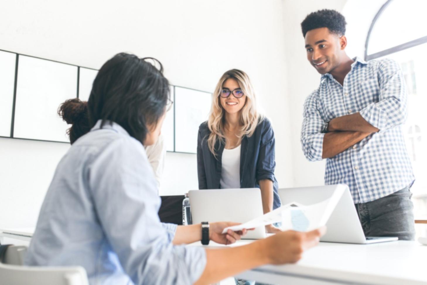 Corporate finance team analyzing quarterly reports